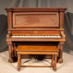 Beckwith Oak Empire Revival Style Upright Piano
