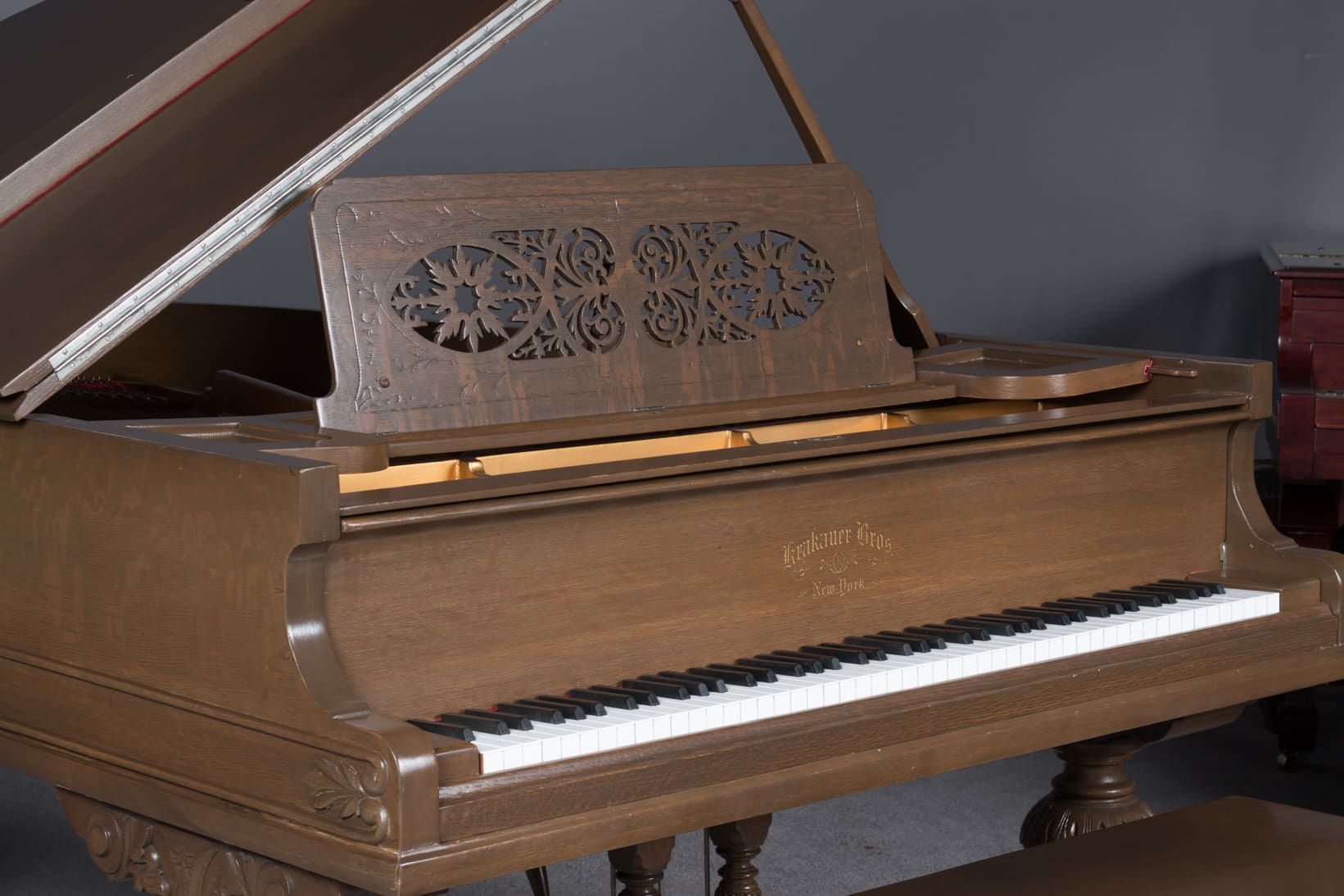 Matt Damon's Krakauer Eastlake Style Victorian Oak Grand Piano