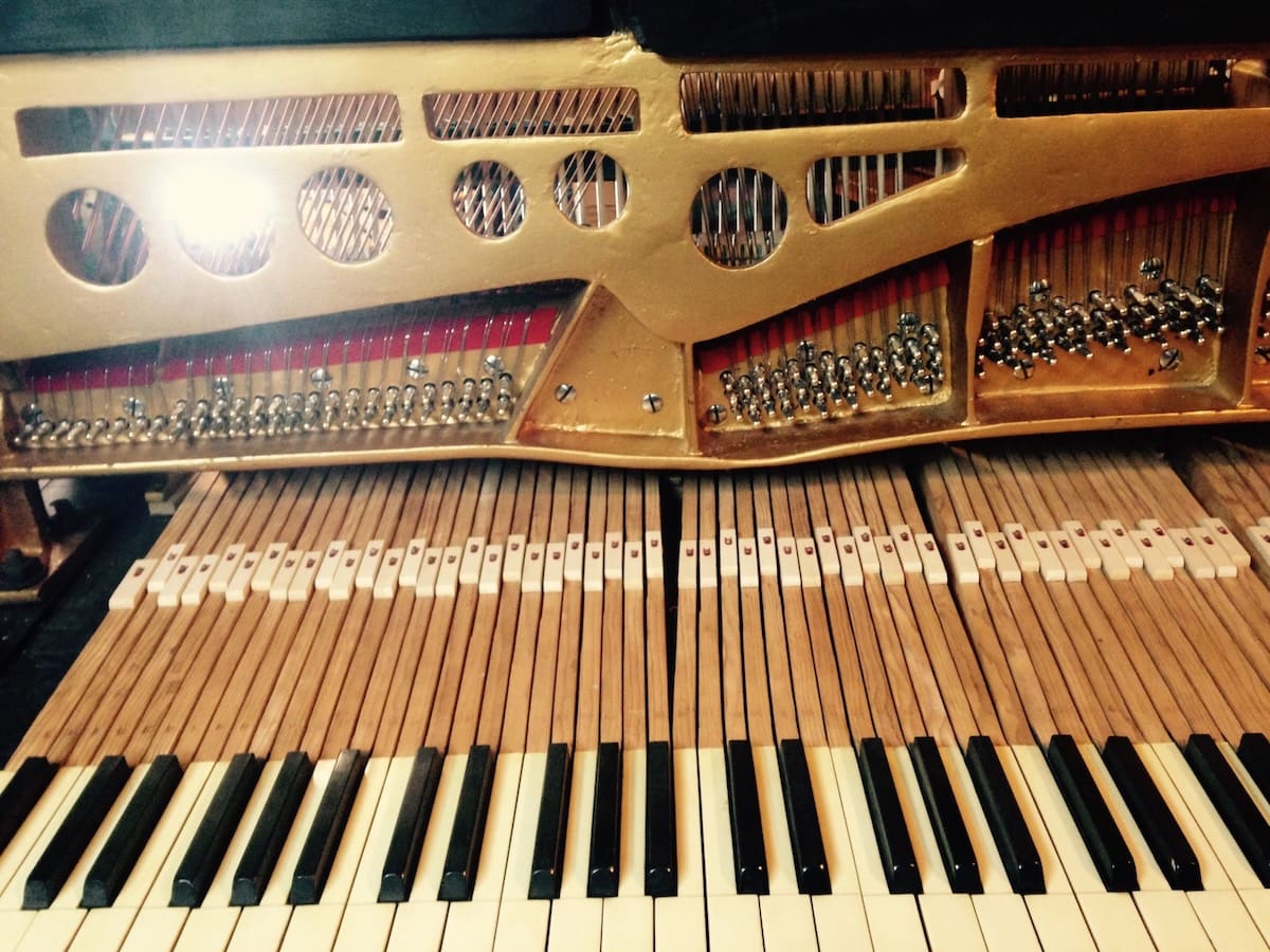 Conover Giraffe Style Symphonic Upright Piano - Antique Piano Shop